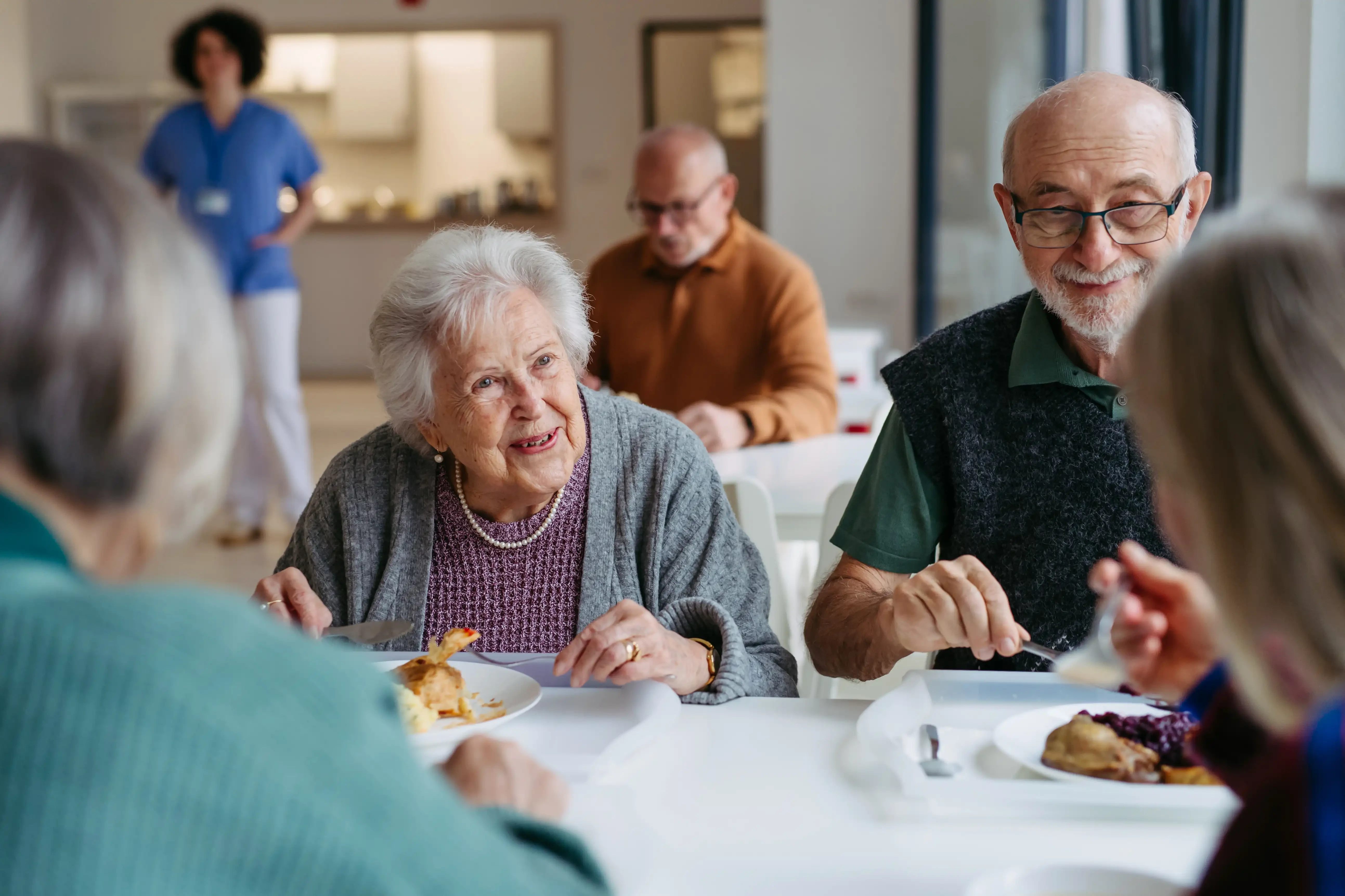 Warm, inviting senior living community lounge